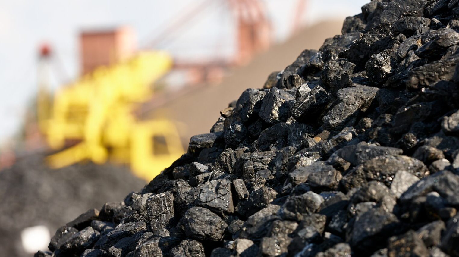 Big,Heaps,Of,Coal,And,A,Excavator,Is,In,The